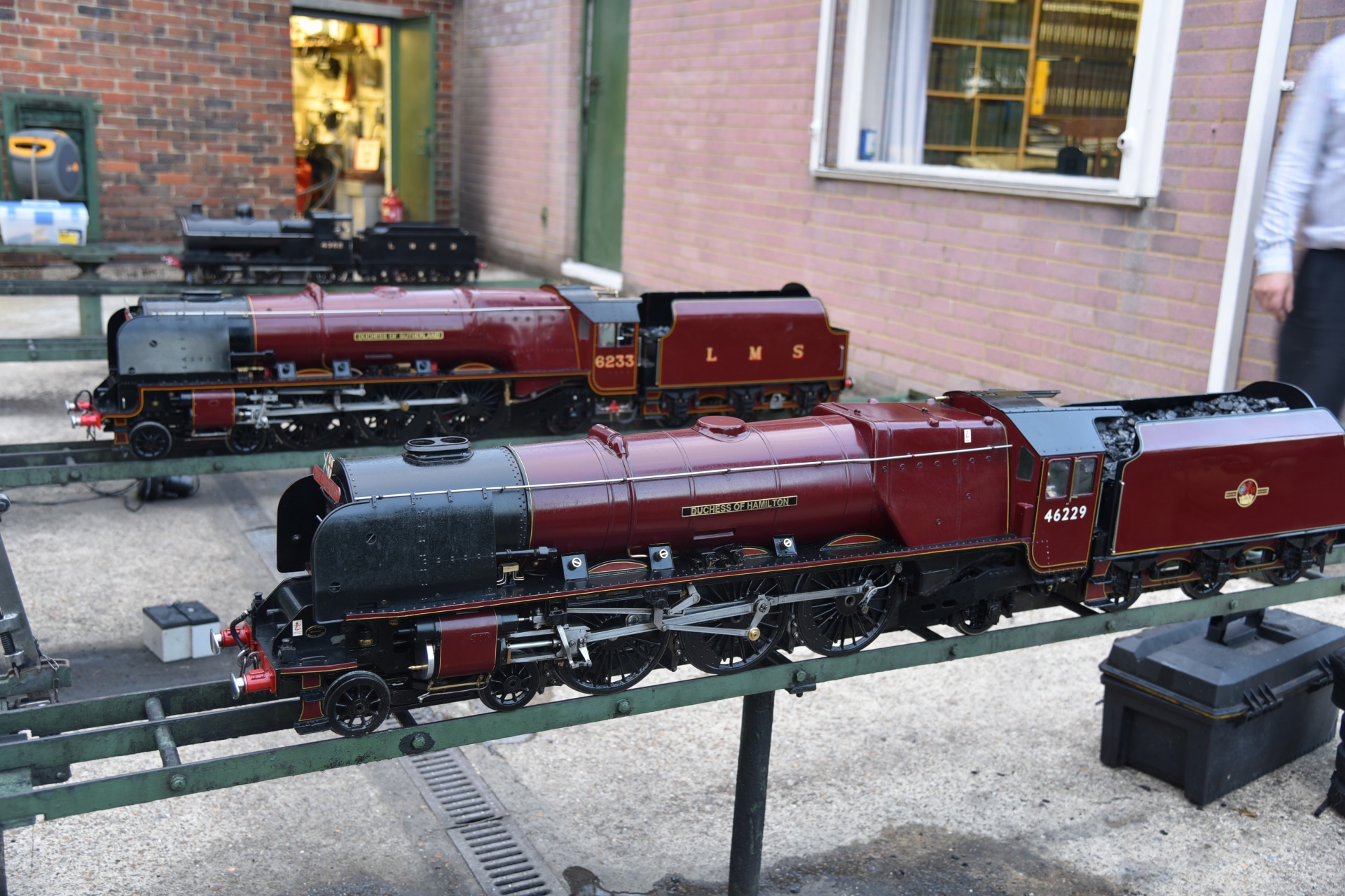 Two model locomotives in the steaming bays.